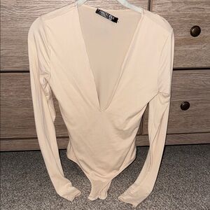 Cream V-Neck Long Sleeve Bodysuit